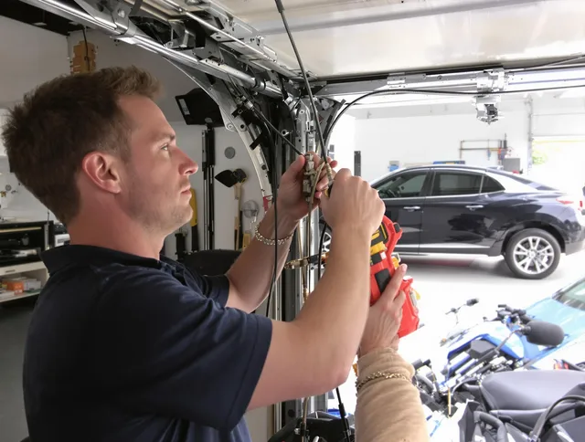 Wareham Garage Door Repair safety certified technician performing cable replacement in Wareham