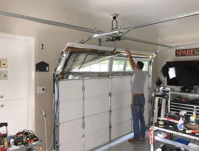 Garage door section replacement by Wareham Garage Door Repair in Wareham