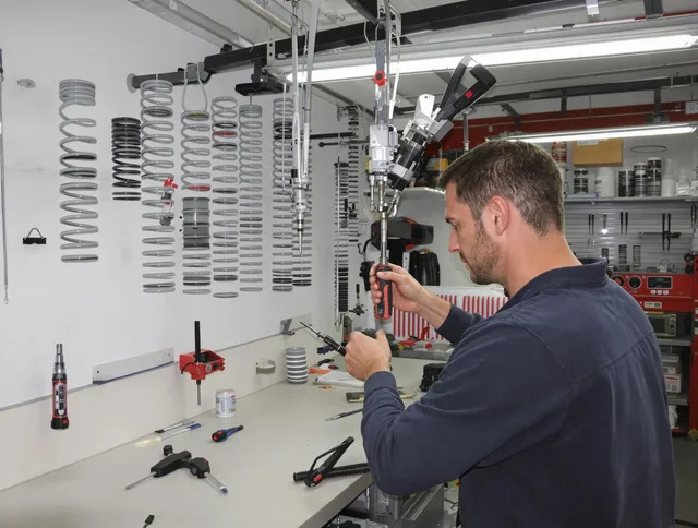Wareham Garage Door Repair safety certified technician performing precision spring replacement in Wareham