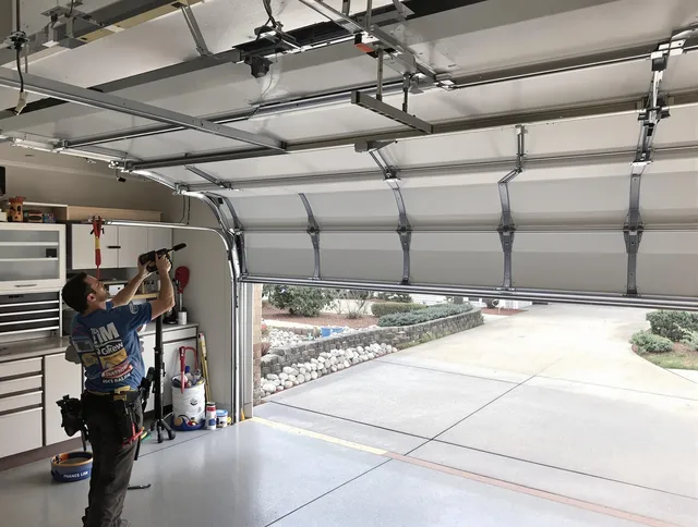 Garage door track repair service by Wareham Garage Door Repair in Wareham